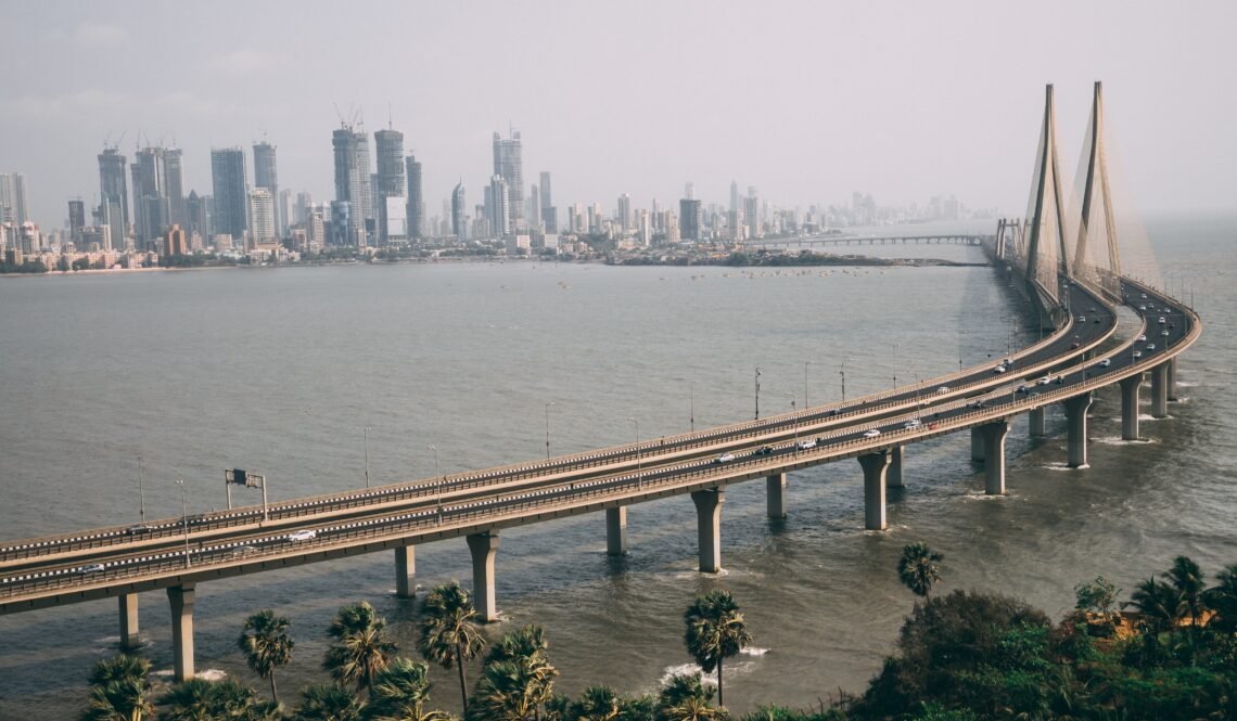 A high angle shot of Bandra Worli sealink in Mumbai enveloped with fog